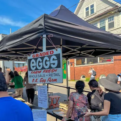 Egg vendor outdoors at the Kitchener Market