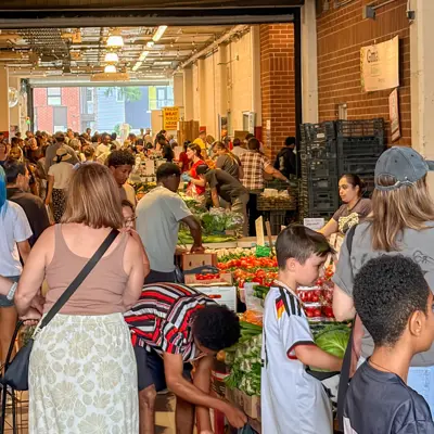 Patrons shopping indoors at the Kitchener Market 